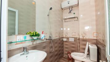 Shower, free toiletries, hair dryer, slippers