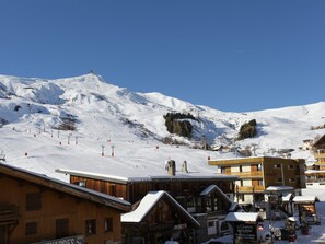 A wooden building with a sign for 'Hotel Plessis Sud'. - Renovated 5 pers. apartment with south balcony, station center (La Toussuire)