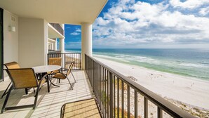 A balcony with a view of the beach and ocean. - The Oasis at Orange Beach, formerly known as Phoenix West II, Unit 703 (Orange Beach)