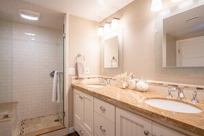 Combined shower/tub, hair dryer, towels, soap
