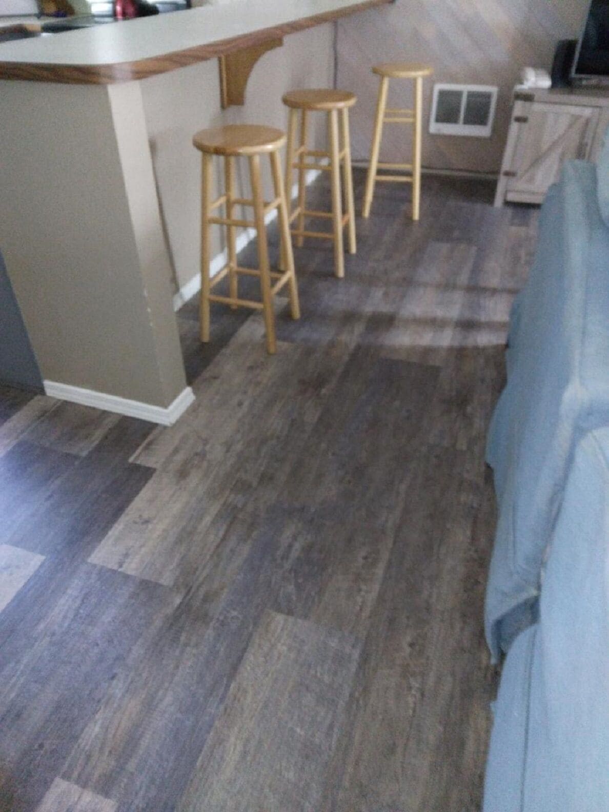 New vinyl floors in entire upstairs - kitchen, living room, dining room area.
