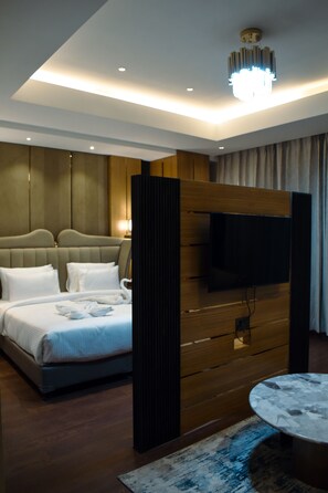 Luxury Suite | Living area | Flat-screen TV - The Mystic Palms (Mathura)