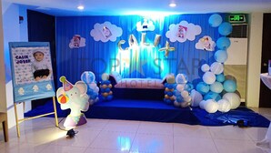 A stage with a blue backdrop, balloons, and a sign that reads "CALIX JOSEF". - Top Star Hotel (Cabanatuan)