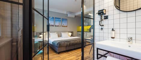 Superior Studio Suite, 1 Bedroom, Kitchenette, City View | Bathroom | Shower, rainfall showerhead, eco-friendly toiletries, hair dryer