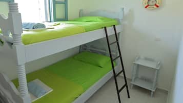 Premium bedding, memory-foam beds, desk, laptop workspace