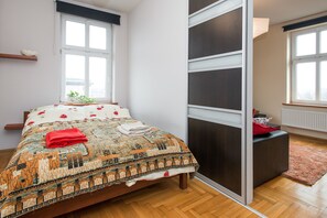 Economy Loft, 1 Bedroom, Kitchen, City View | 1 bedroom, desk, iron/ironing board, free cribs/infant beds - Sunday Morning Apartments (Kraków)