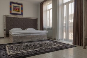 Suite, Balcony | Premium bedding, minibar, soundproofing, iron/ironing board - Home Guest Residence (Bishkek)