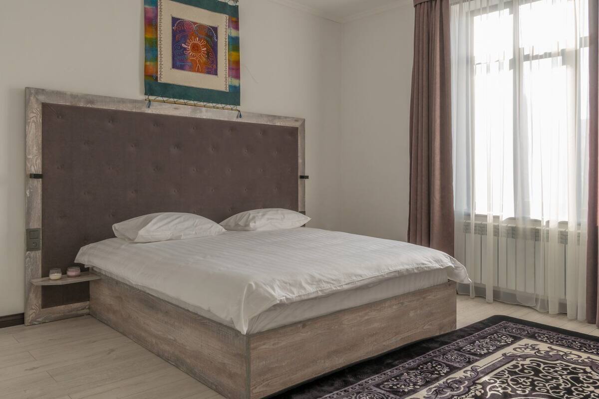 Biancheria da letto di alta qualità, minibar, insonorizzazione