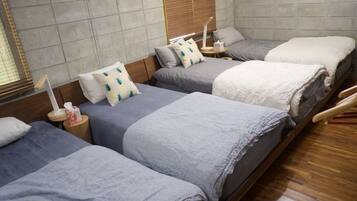 Design House, 2 Bedrooms, Kitchen, Ocean View | 2 bedrooms, desk, iron/ironing board, travel crib