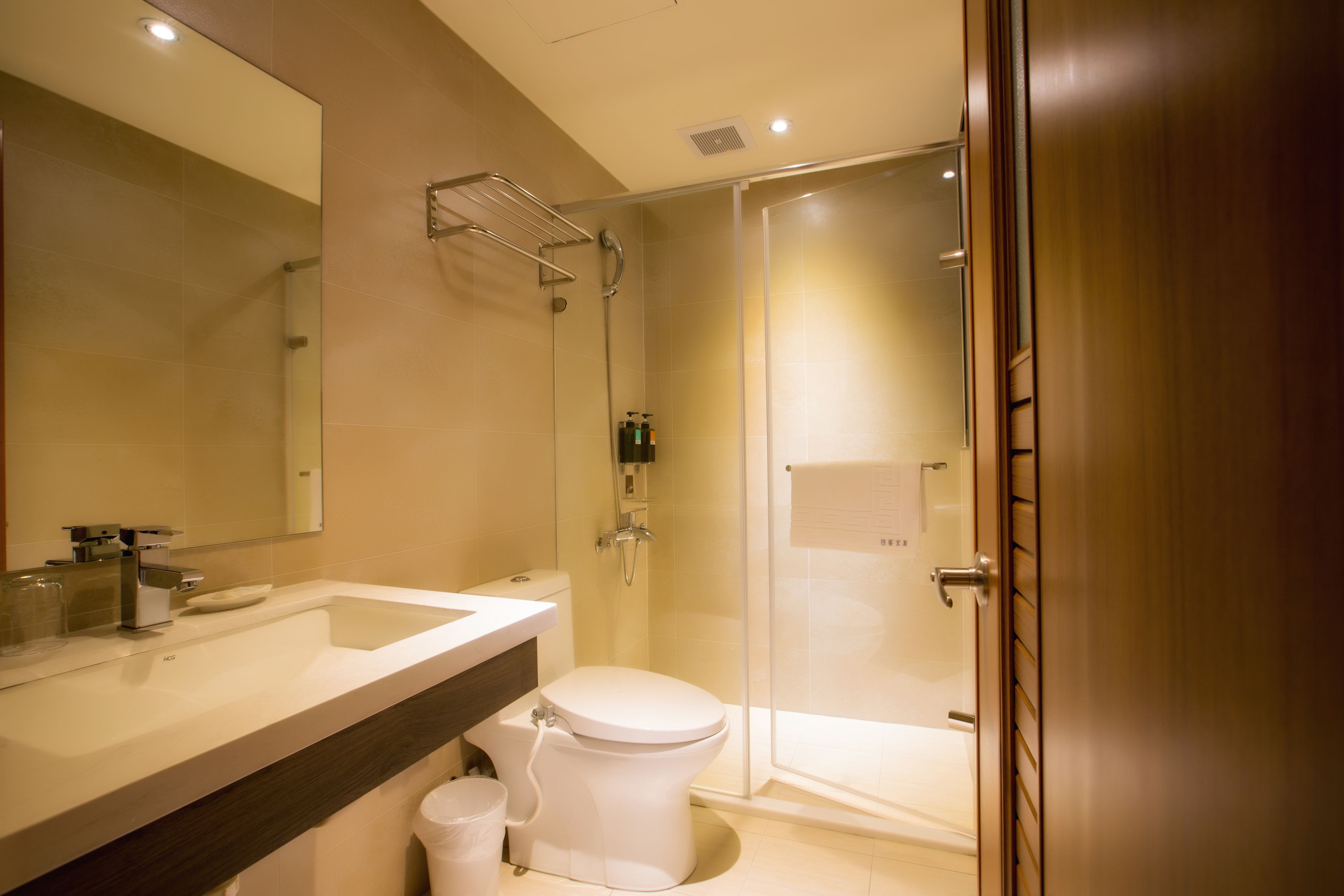 hair dryer, slippers, towels, shampoo