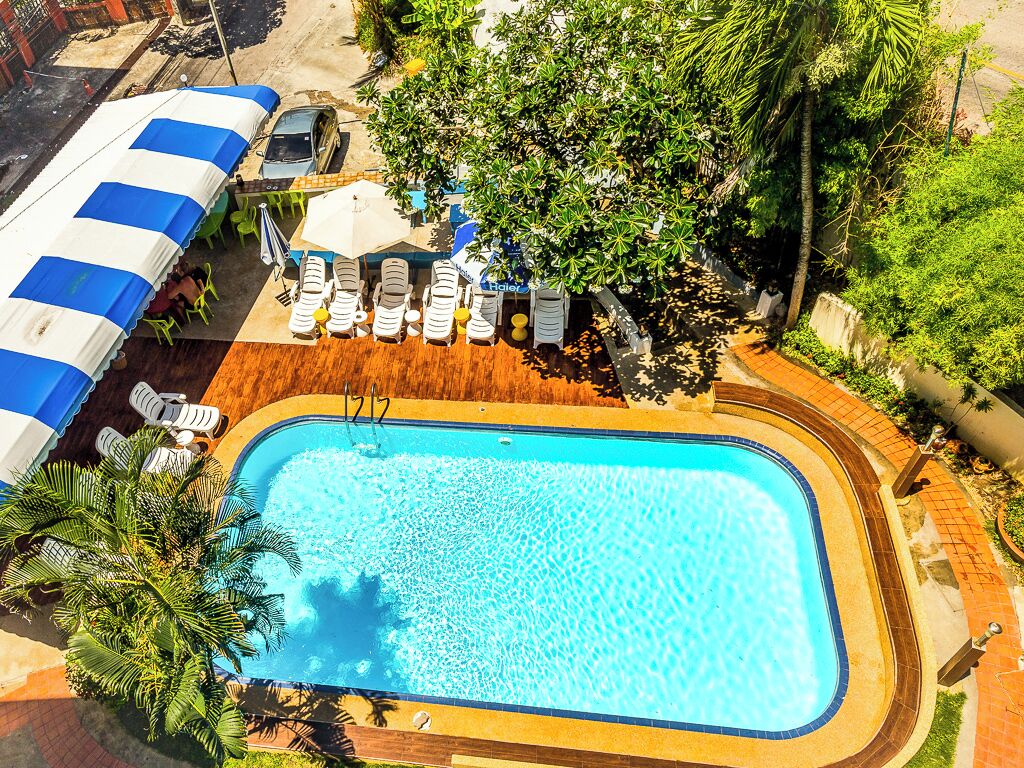 deluxe triple room, resort view | garden view