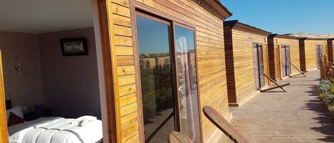 Bungalow Deluxe, vue sur la lagune (Queen-Size Bed) | 1 chambre, literie de qualité, minibar, accÚs au Wi-Fi (inclus)