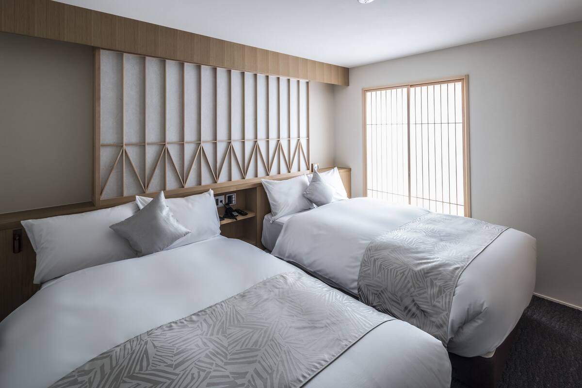 Suite, plusieurs lits, coin cuisine | Literie de qualité supérieure, couette en duvet d'oie, minibar