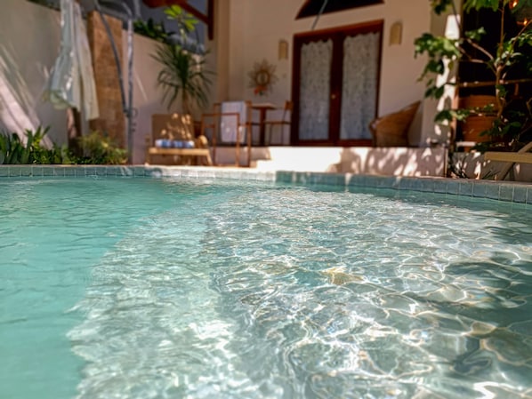 Outdoor pool, open 9:30 AM to 8:00 PM, pool umbrellas, sun loungers