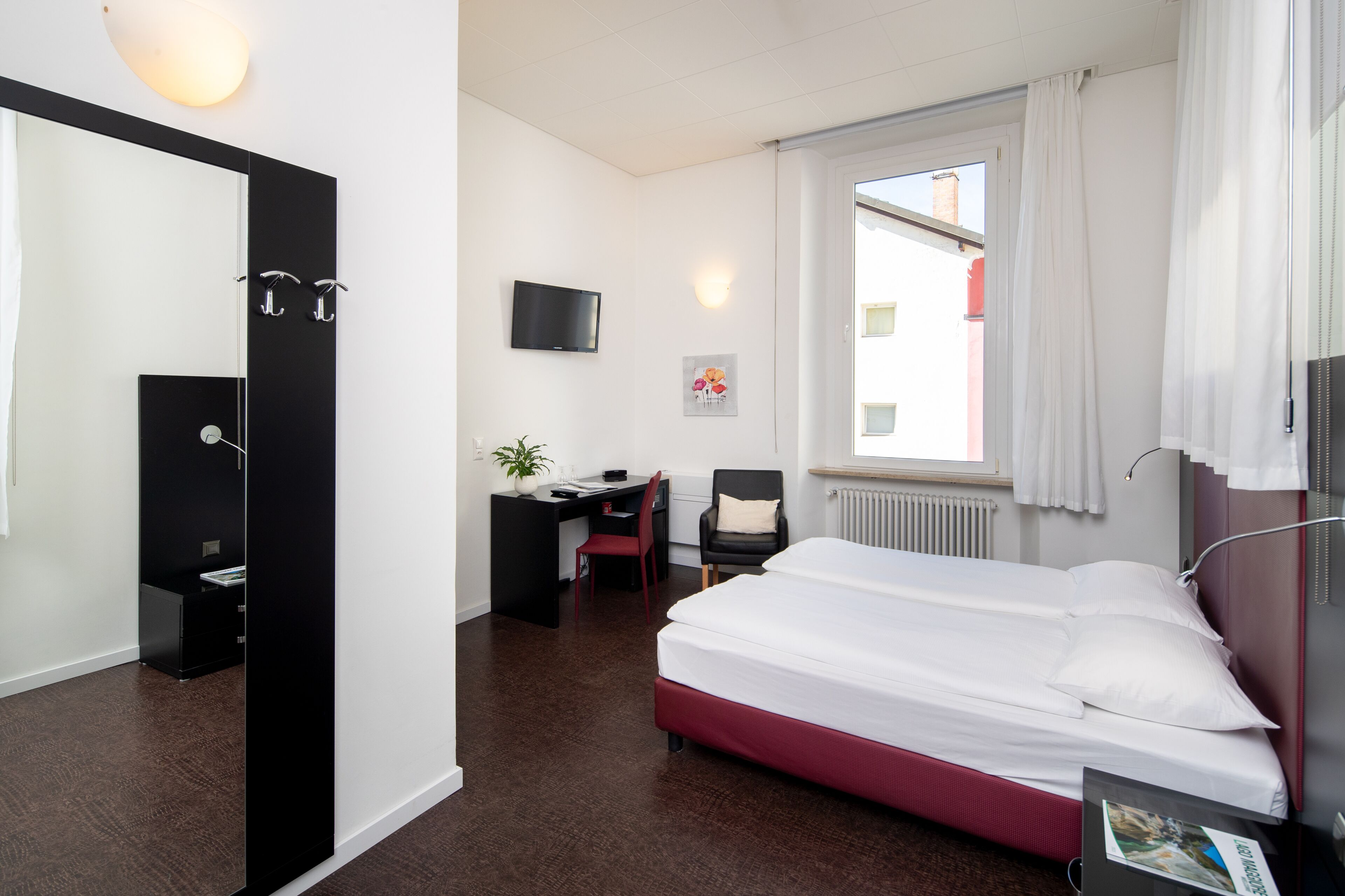 comfort double or twin room | minibar, in-room safe, desk, laptop workspace