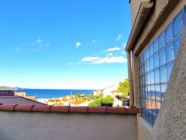 Enjoy breathtaking views of the sea from this Mediterranean-style balcony.