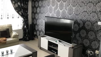 Appartement, 1 slaapkamer | Woonruimte | Flatscreentelevisie