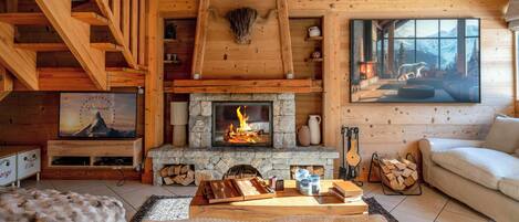 Televisión, chimenea, reproductor de DVD y tenis de mesa