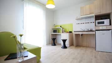 Apartment, 2 Bedrooms | Living area | Flat-screen TV