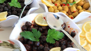 A variety of dishes with lemon slices and parsley garnish. - Hotel Terrace Istanbul (Istanbul)