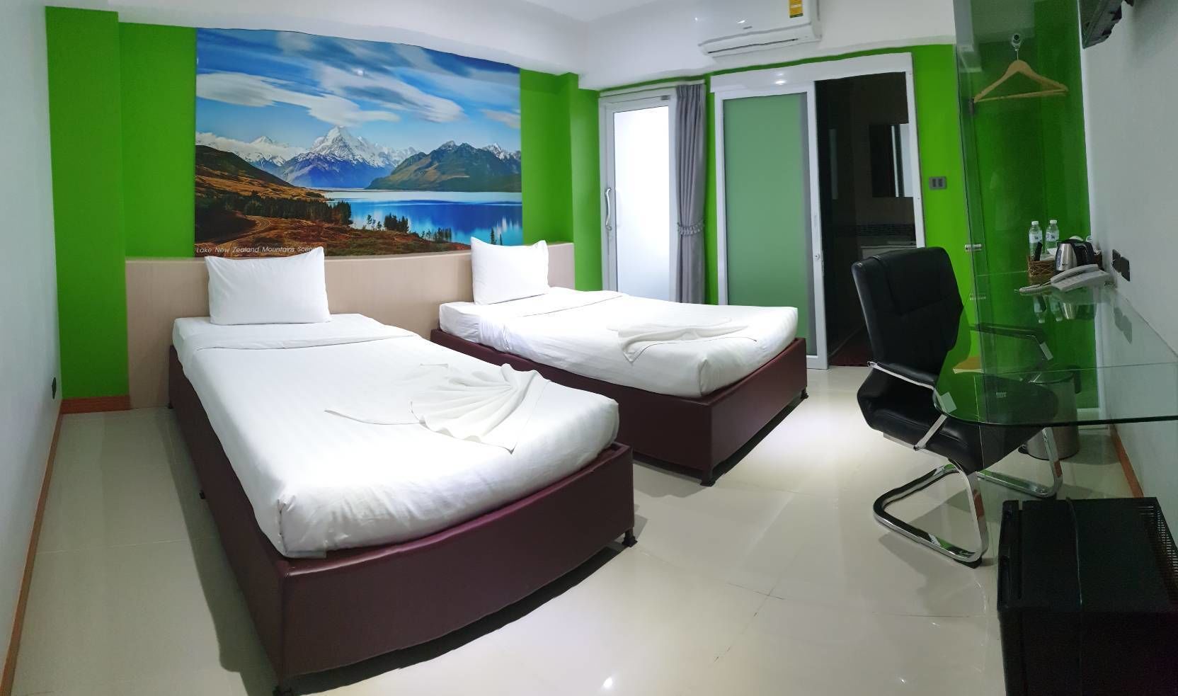 twin room | desk, laptop workspace, blackout curtains, soundproofing