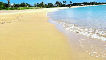 On the beach, sun loungers, beach towels