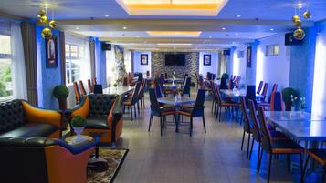 Breakfast, lunch, dinner served; local and international cuisine