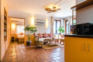 Deluxe Apartment, 1 King Bed, Kitchen | Living room - The Museum Bed and Breakfast (Kathmandu)