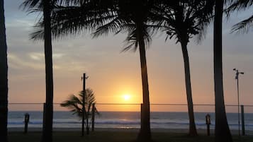 On the beach, sun loungers, beach towels
