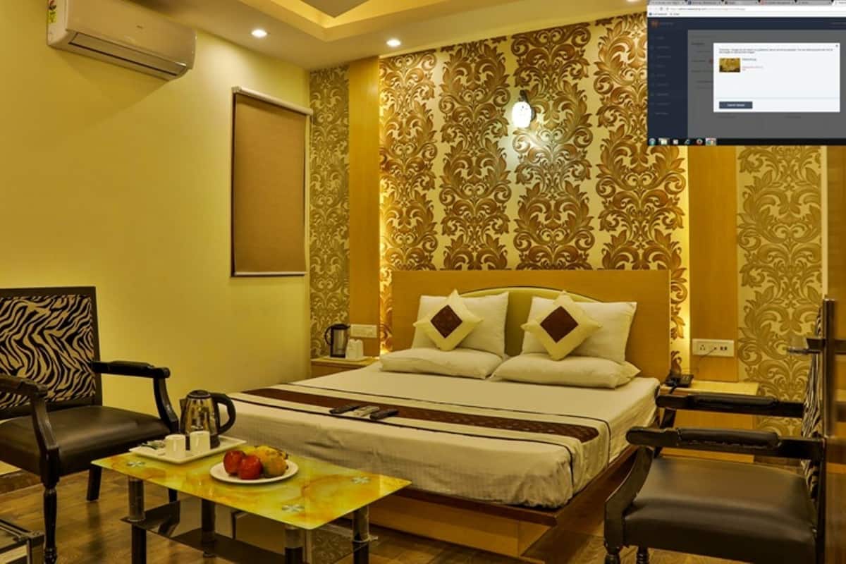 Habitación Deluxe, 1 habitación, baño privado, vista a la ciudad | Sala de estar | Televisión y películas con cargo