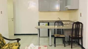 Apartment, 1 Bedroom (for 4) | Private kitchen | Fridge, stovetop