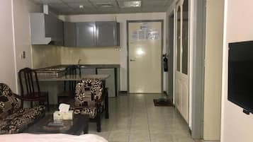 Apartment, 1 Bedroom (for 4) | Living area | 32-inch LED TV with satellite channels, TV, streaming services