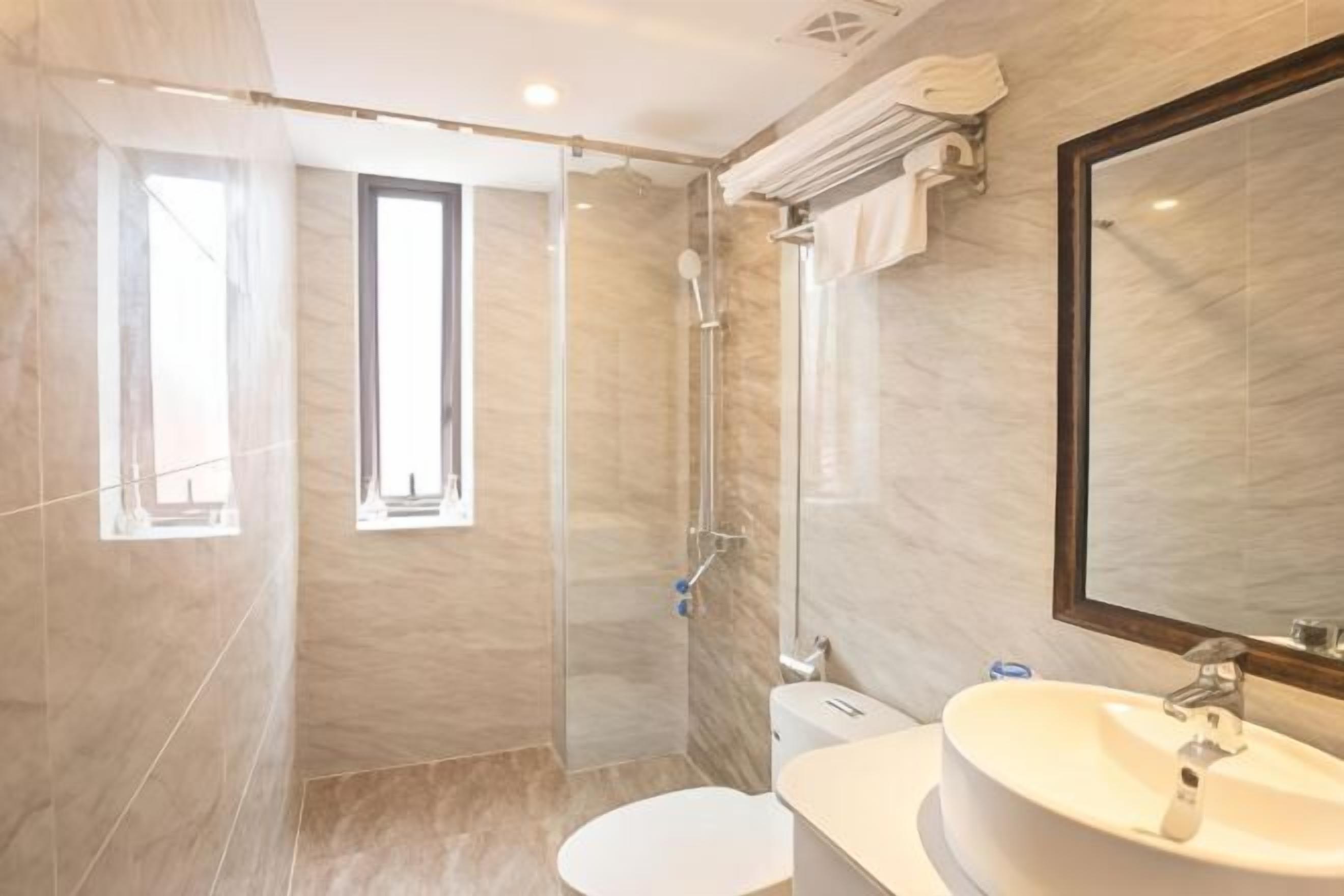 Bathroom | Shower, free toiletries, hair dryer, bathrobes