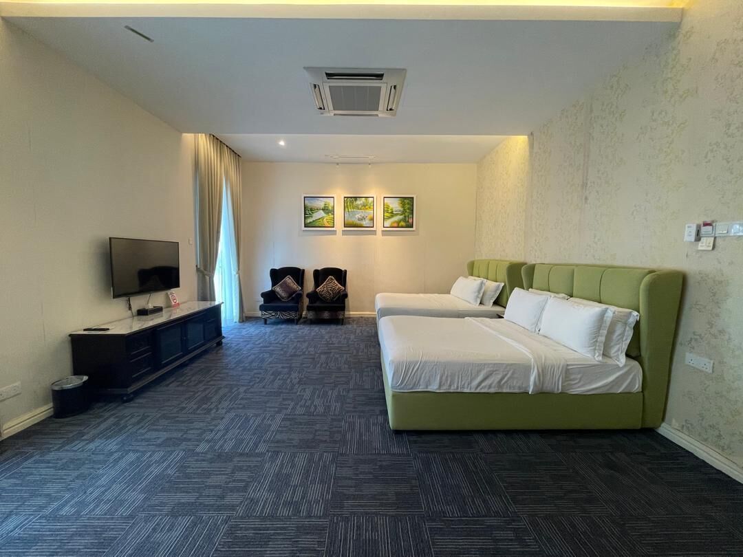 Family Room, 2 Queen Beds, Balcony, Garden View | Desk, blackout drapes, iron/ironing board, free WiFi