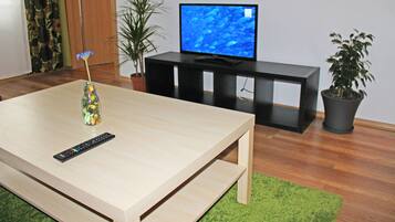 Comfort Apartment, 1 Bedroom, Kitchen | Living area | Flat-screen TV
