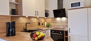 Réfrigérateur, micro-ondes, four, lave-vaisselle