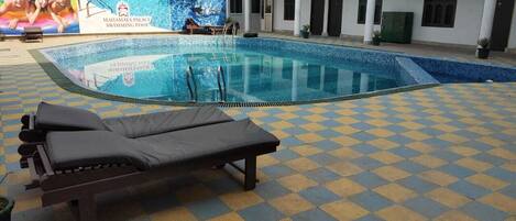 Outdoor pool, pool loungers
