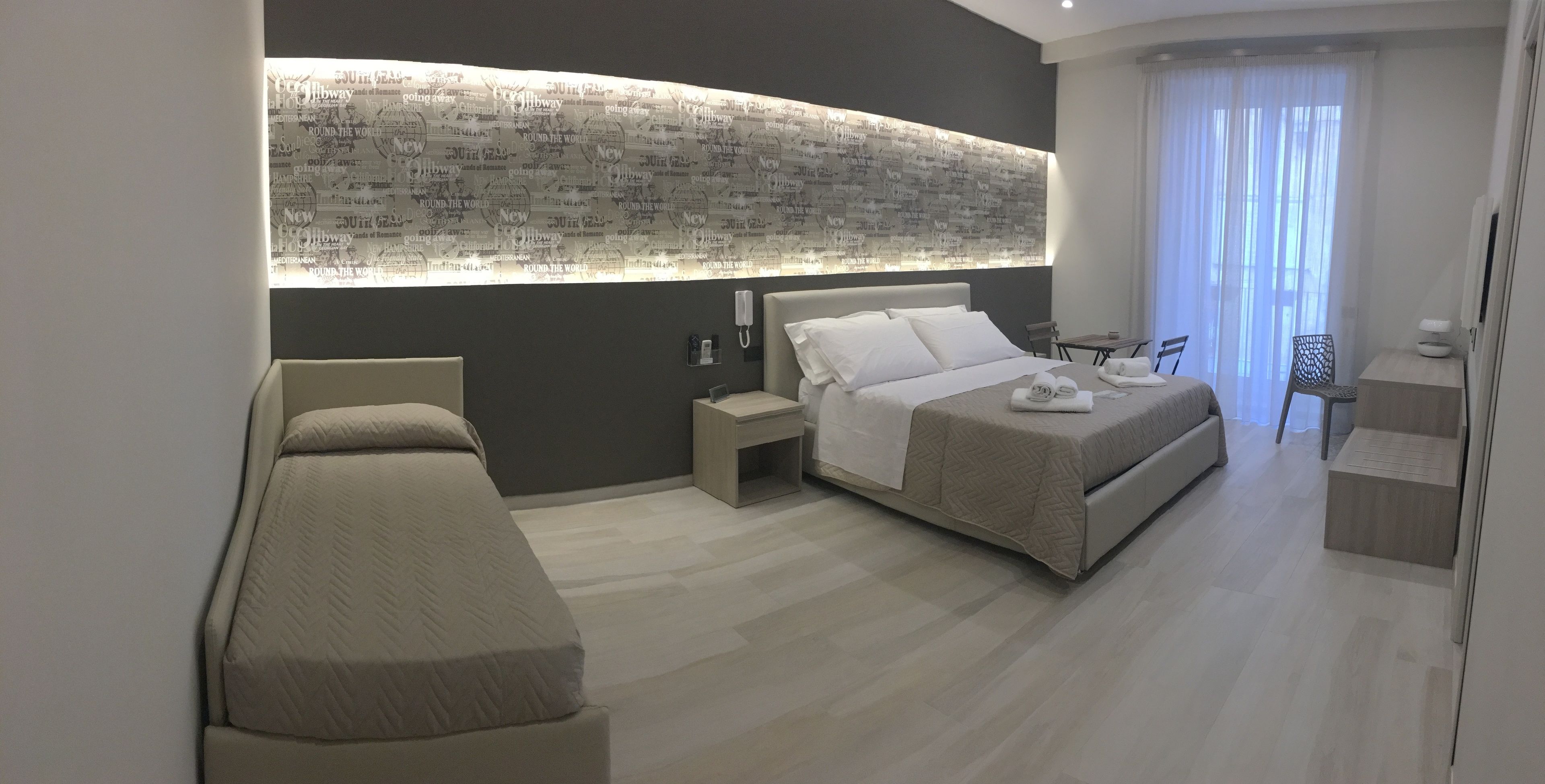 Comfort Quadruple Room | Premium bedding, in-room safe, desk, soundproofing