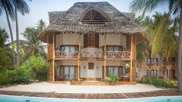 Luxury Villa, 4 Bedrooms, Ocean View, Beachfront | Minibar, in-room safe, desk, blackout drapes