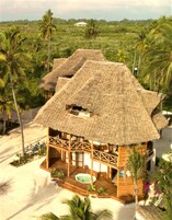 Luxury Villa, 4 Bedrooms, Ocean View, Beachfront | Minibar, in-room safe, desk, blackout drapes