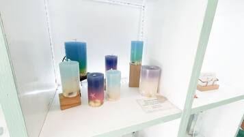 A display of candles with a label indicating 'Beach candle'.