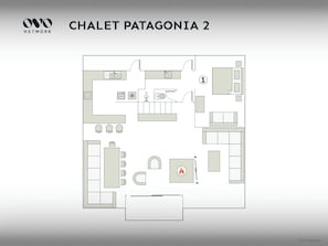 Plano de planta de una habitación de hotel llamada Chalet Patagonia 2, que cuenta con una kitchenette, una zona de estar, una chimenea y una cama.