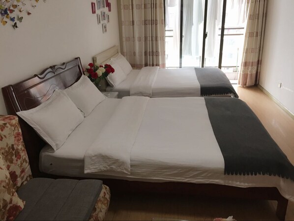 Family Room, 2 Double Beds | Desk, free WiFi