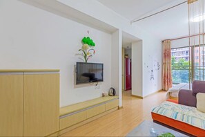 Deluxe-Doppelzimmer | Wohnbereich | Flachbildfernseher