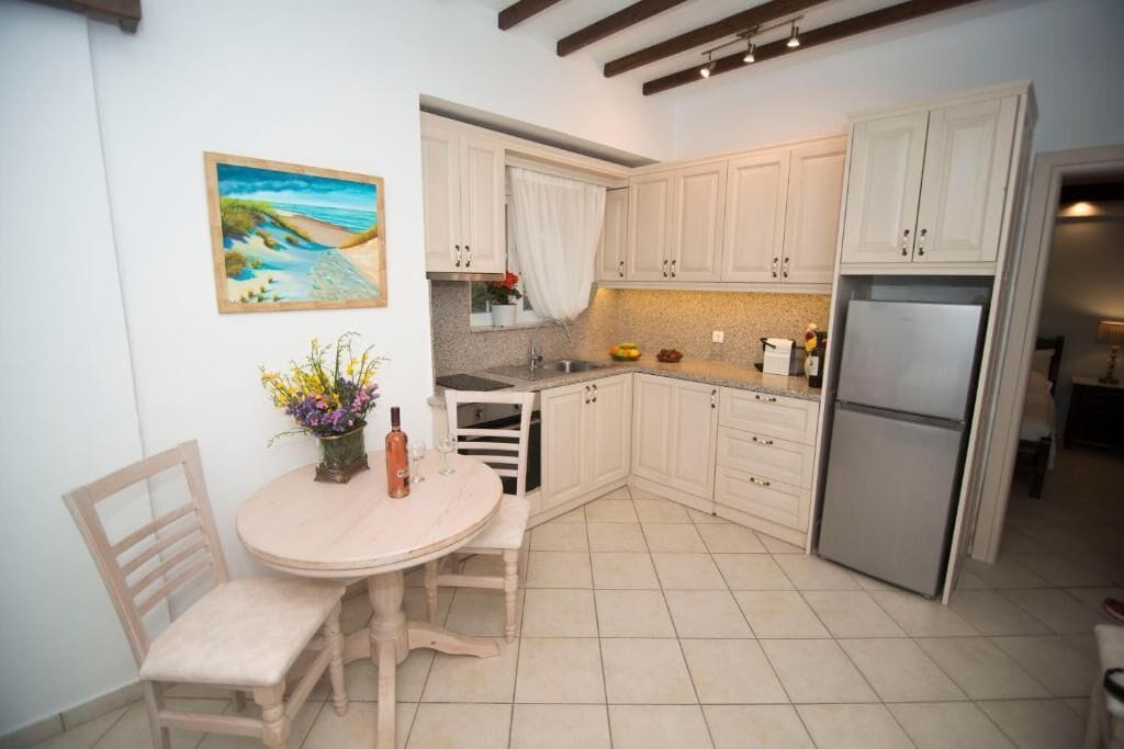 Apartment, 2 Bedrooms | Private kitchen | Coffee/tea maker, fridge, stovetop, electric kettle