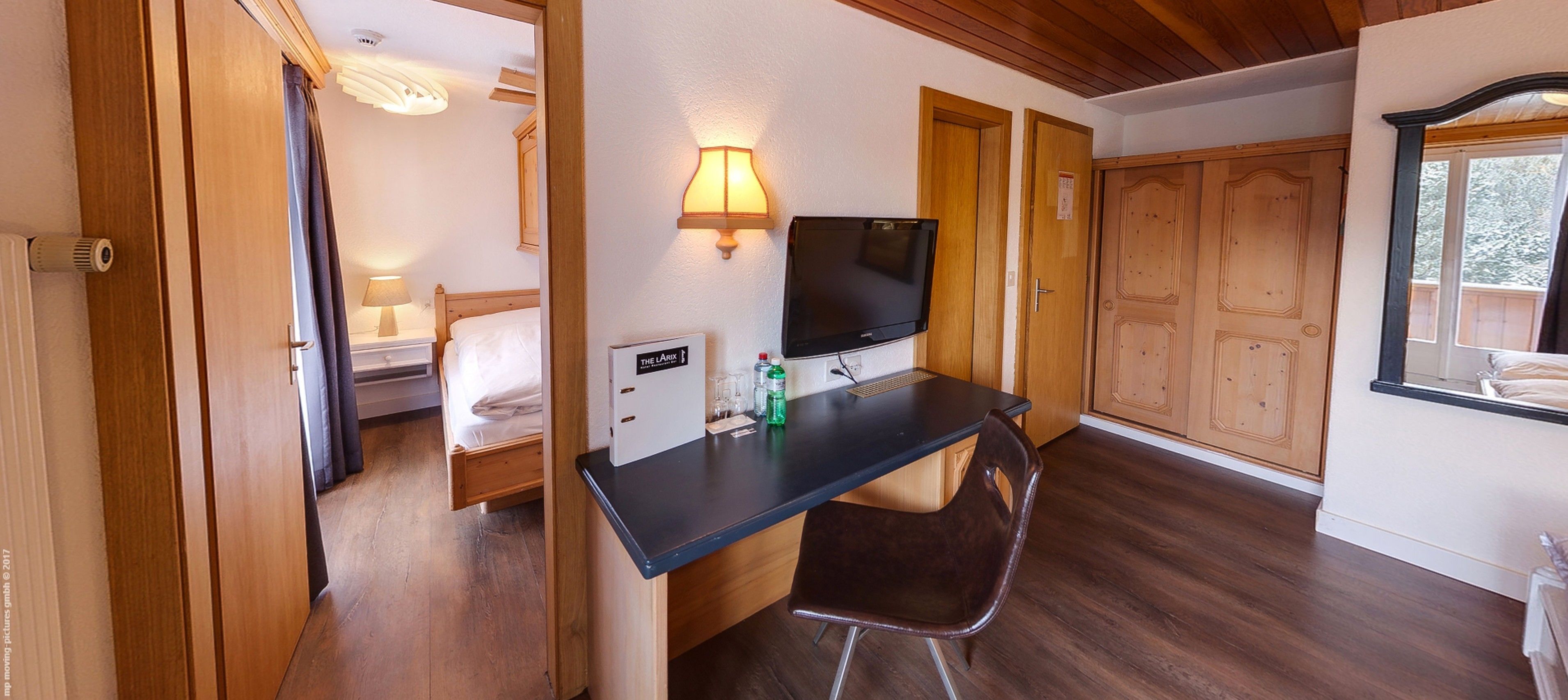 family room, 2 bedrooms | in-room safe, desk, free wifi, bed sheets