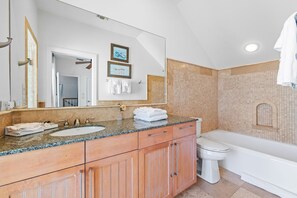 Bathtub, hair dryer, towels