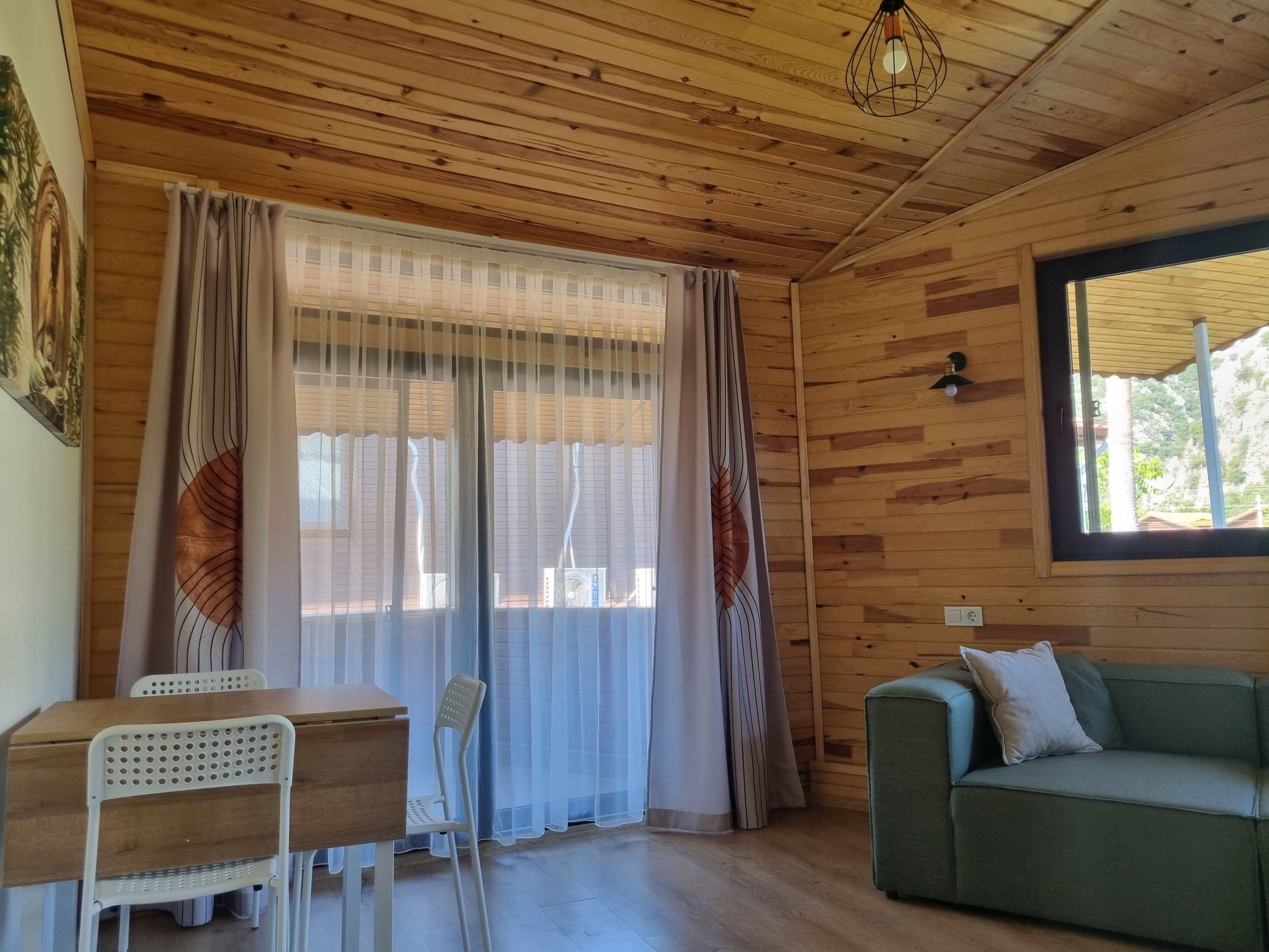 deluxe apartment | living area | 82-cm led tv with satellite channels, tv