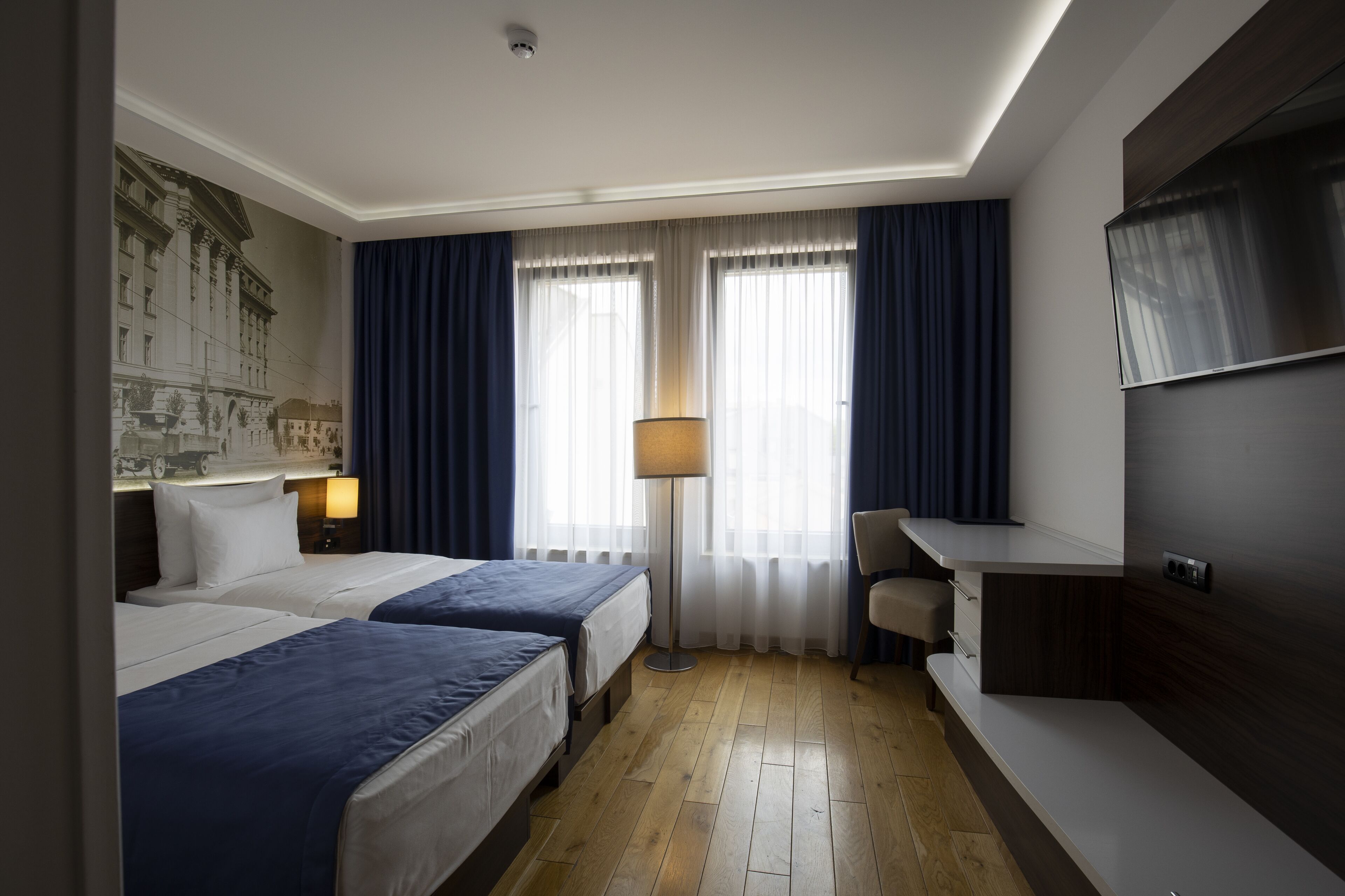 twin room, 2 single beds | 1 bedroom, minibar, in-room safe, desk