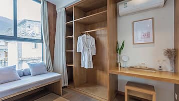 Courtyard 2-Deluxe Double Room, Bathtub, Mountain View | Living room | 50-inch LED TV with cable channels, TV, pay movies